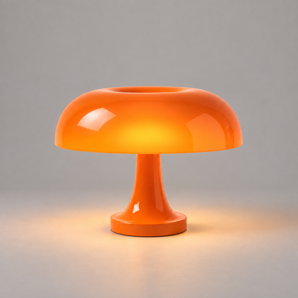 cosmic-orange-1 — Lampe Caldera Cosmic Orange allumée, photo studio sur fond gris