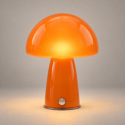tangerine-1 — Lampe Button Tangerine allumée, photo studio sur fond gris