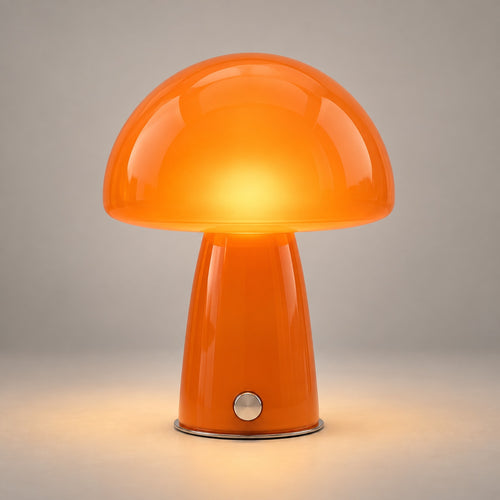 tangerine-1 — Lampe Button Tangerine allumée, photo studio sur fond gris